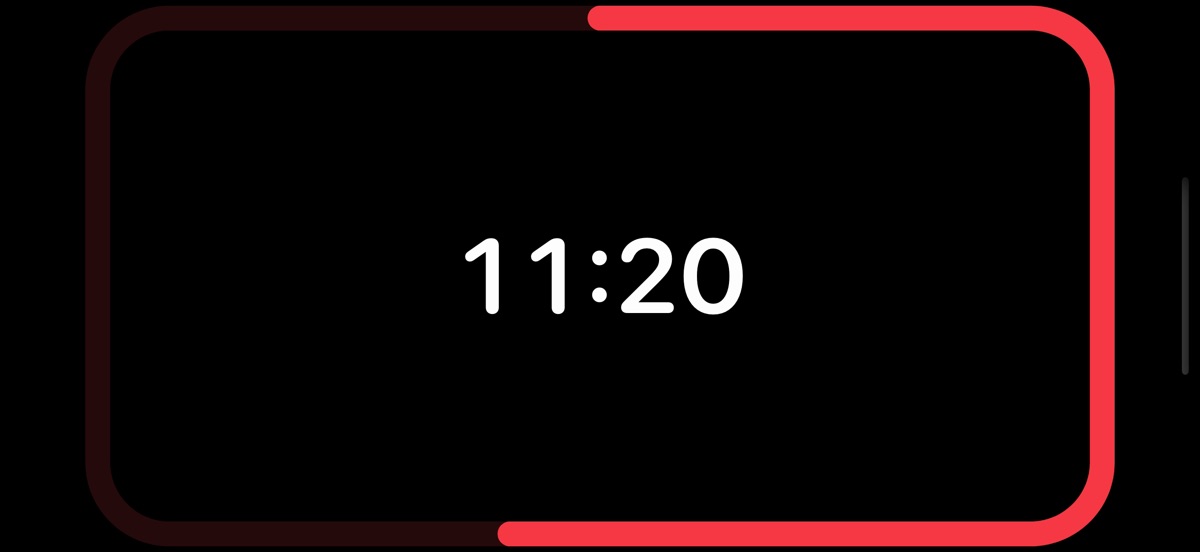 POMONDOR clock in full screen with the phone in landscape